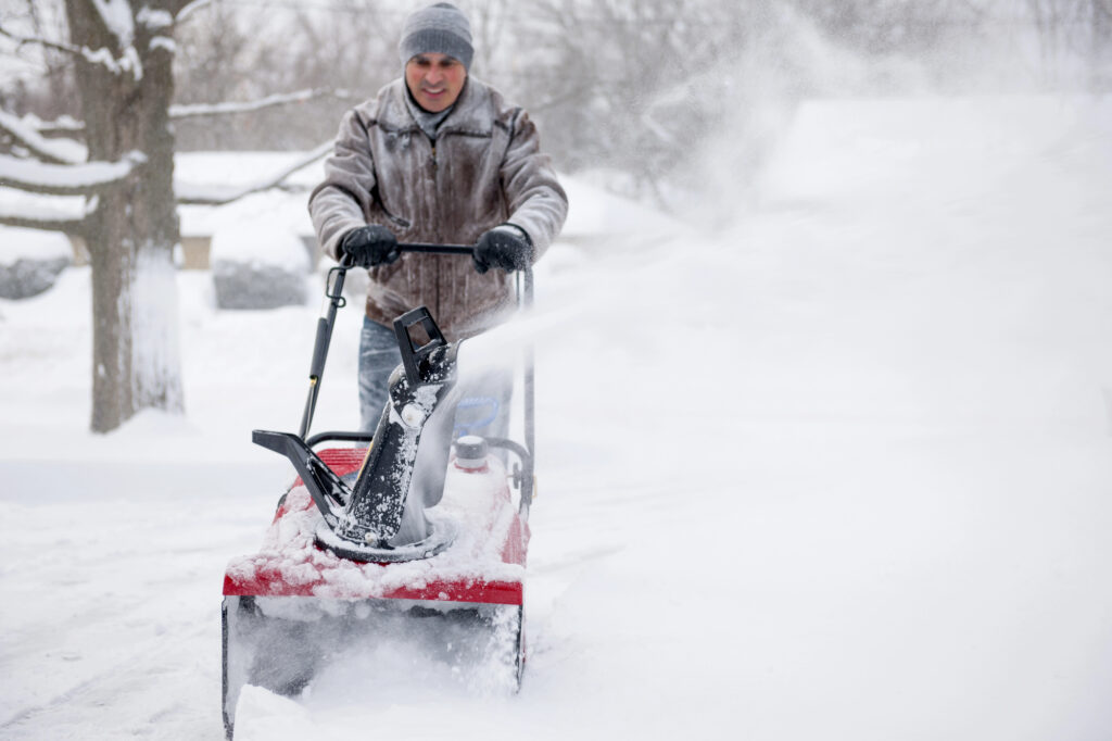 Man removing snow